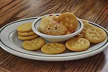 Homemade pimento cheese spread with crackers