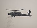 Kuwait Land Forces AH-64 Apache helicopter opens fire upon a series of targets during Al Tahreer