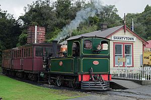 Locomotive NZR L 508 and two passenger carriages at Shantytown station