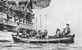 Selkirk, seated in a ship's boat, being taken aboard Duke.