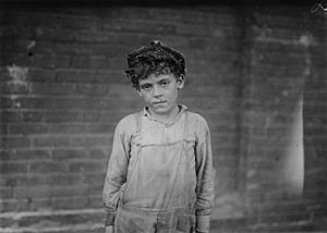 One of the young doffers working in Pell City Cotton Mill. Supt. of Mill is also Mayor of Pell City. Pell City, Ala. - NARA - 523356 borderless