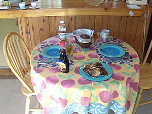 Table setting with pancakes in a California mountain cabin, 2009
