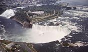 AERIAL VIEW OF NIAGARA FALLS SHOWING THE AMERICAN FALLS (UPPER LEFT) AND THE CANADIAN OR HORSESHOE FALLS- (CENTER) - NARA - 549473 02