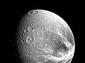 Fractured terrain on Dione imaged from a distance of 240,000 km from Voyager 1