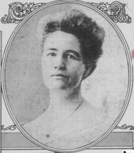A black and white head-shot photograph of a woman