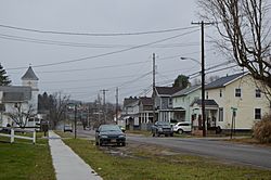 Houses on Main Street; the Methodist church is at left