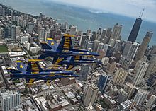 The U.S. Navy Flight Demonstration Squadron, the Blue Angels, diamond pilots fly over Chicago during the 2019 Chicago Air and Water Show. (48599021741)