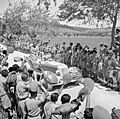 King George VI is driven past cheering Indian troops on his way to a ceremony to invest Sepoy Kamal Ram with the Victoria Cross, Italy, 26 July 1944. NA17265