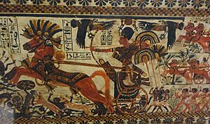 King Tut charging enemies, 18th dynasty