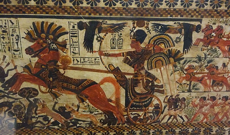 King Tut charging enemies, 18th dynasty