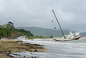 Rumrunner on the Beach, Stricken yacht washed onto the beach at Cannonvale, 1 February 2010