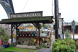 Sign for dock called The Old Boathouse just east of south end of the Aurora Bridge