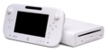 A white Wii U console and gamepad.