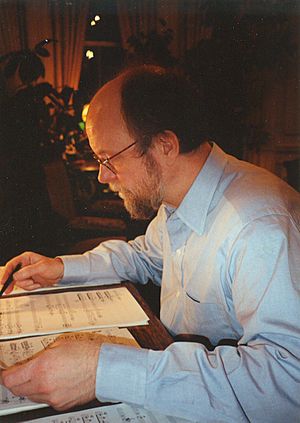 Charles Wuorinen at desk 2.jpg