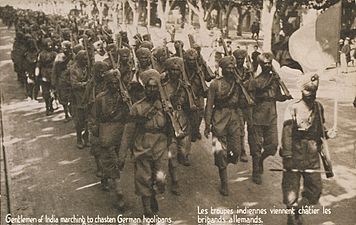 Gentlemen of India marching to chasten German hooligans 1914