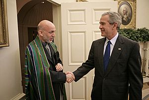 Hamid Karzai being welcomed by George W. Bush in 2006