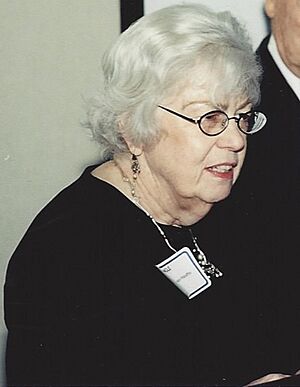 Maryann Mahaffey speaking at 50th anniversary for Henry Messer and Carl House