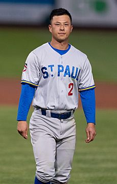 A baseball player wearing a gray baseball uniform that says "St. Paul" and the uniform number two
