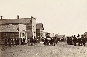 Santa Fe Train passing through Ellsworth, Kansas, 1867. (Boston Public Library) (cropped)