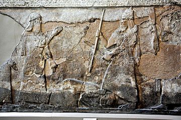 Tiglath-pileser III and submission of an enemy, 8th century BC, from Nimrud, Iraq. The British Museum