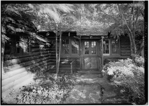 VIEW OF NORTHWEST ELEVATION AND ENTRANCE - Cypress Log Cabin, 215 Lake Front Drive (moved from Chicago, IL), Beverly Shores, Porter County, IN HABS IND,64-BEVSH,2-1
