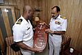 100323-N-OX597-187 Indian navy Vice Adm. D. K. Joshi, right presents a wooden plaque
