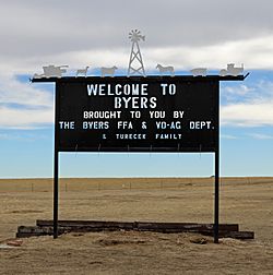 A welcome sign in Byers.