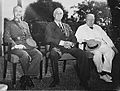Three men, Chiang Kai-shek, Roosevelt and Churchill, sitting together elbow to elbow
