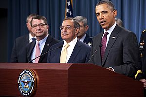President of the United States Barrack Obama delivers a press brief along with Secretary of Defense Leon Panetta and General Martin Dempsey