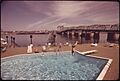SWIMMING POOL OF THUNDERBIRD MOTEL ON THE COLUMBIA RIVER WITHIN YARDS OF THE INTERSTATE BRIDGE CONNECTING WASHINGTON... - NARA - 548083