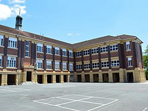 Depression-era Brick School Building (Block A) and parade ground, from SE (2015)