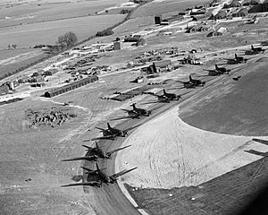 Douglas Dakotas of No. 233 Squadron RAF lined up on the perimeter track at Blakehill Farm, Wiltshire, for an exercise with the 6th Airborne Division, 20 April 1944. CH12833.jpg