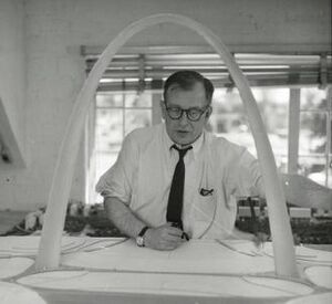 Eero Saarinen with Gateway Arch Model