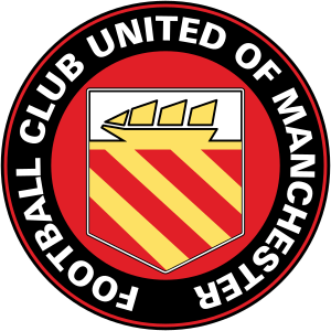 A circular badge with "Football Club United of Manchester" written in white capitals just inside the black circumference with a red trim. Inside is a yellow crest on a red background. The crest has a yellow ship with three sails on a white background, and three yellow stripes on a red background.