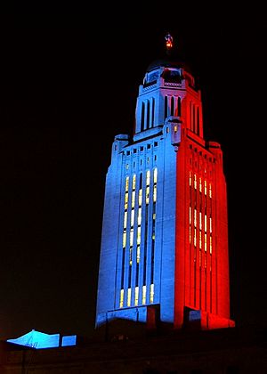 Nebraska State Capitol illuminated blue and red