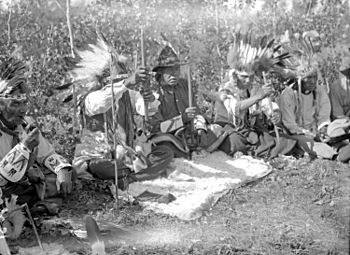 Pipe Ceremony at Waterhen River, Northern Saskatchewan (Note- The beaded gauntlets were collected by Paul Coze) (20186418649)