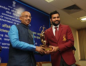 The Minister of State for Youth Affairs and Sports (IC), Water Resources, River Development and Ganga Rejuvenation, Shri Vijay Goel conferring the Arjuna Award on Cricketer Rohit Sharma, in New Delhi on September 16, 2016