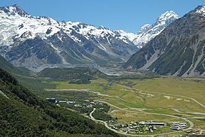 Mount Cook Village down below in Hooker Valley, The Hermitage on the left, lodge & motel complex on the bottom right