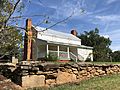 Aaron and Margaret Parker Jr. House front including stone wall