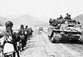 Centurion tanks and infantry of the Gloucestershire Regiment advancing to attack Hill 327 in Korea, March 1951. BF454