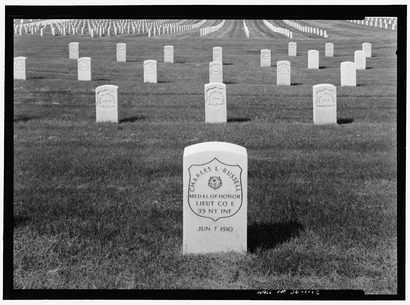HEADSTONE OF MEDAL OF HONOR RECIPIENT CHARLES L. RUSSELL, SECTION 3-E, GRAVE R1. VIEW TO NORTH. - Hot Springs National Cemetery, Virginia Medical Center; 500 North Fifth Street, Hot HALS SD-1-12