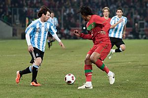Lionel Messi (L), Bruno Alves (R) – Portugal vs. Argentina, 9th February 2011