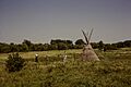 Visitors taking photos in front of a Buffalo skin teepee in Pipestone National Monument. Image Number 74-333-23. (138db3bc9d3e493c9d99e74f639b2bdf)