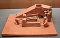 Winnowing machine and tilt hammer