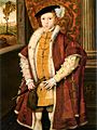 Painting of Edward at 9 years. Both the pose of the prince and his dress imitate portraits of Henry VIII. The child wears a broad-shouldered mantle of dark velvet over his clothes which are ornately embroidered in gold thread. He wears a prominent cod-piece and carries a dagger. His short red hair can be seen beneath his cap, contrasting with dark eyes. He looks well and robust.