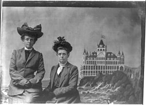 Frances Benjamin Johnston, with Mattie, with a painted backdrop of the Cliff House in San Francisco, California, 1903