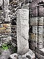 Kilmalkeader Church stone inscribed with alphabet