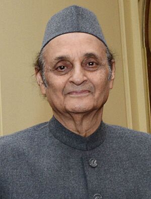 Pranab Mukherjee receiving the first copy of the book entitled "VB-Raju-The Visionary Leader" from the President of ICCR, Dr. Karan Singh, at Rashtrapati Bhavan (cropped).jpg