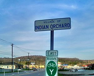 Signage on U.S. Route 6 eastbound entering the village of Indian Orchard.