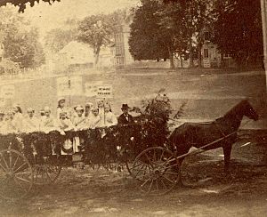 "The Coming Woman" float in Bethel, Maine 1874